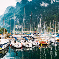 Buy canvas prints of Riva del Garda, Italy - October 2, 2021: Boats and yachts moored by Joaquin Corbalan