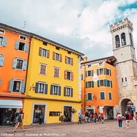 Buy canvas prints of Riva del Garda, Italy - September 22, 2021: Colorful streets of  by Joaquin Corbalan