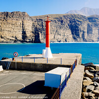 Buy canvas prints of Entrance to the mouth of the port of Agaete with the beautiful c by Joaquin Corbalan