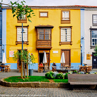 Buy canvas prints of  Colorful facades in the streets of the old town of San cristoba by Joaquin Corbalan