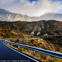 Buy canvas prints of Winding road leads to high mountains with clouds to escape the r by Joaquin Corbalan