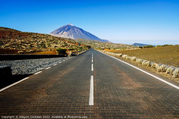 A paved road leads adventurous tourists to the highest peak in S Picture Board by Joaquin Corbalan