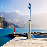 Buy canvas prints of Entrance to the mouth of the port of Agaete with the beautiful c by Joaquin Corbalan