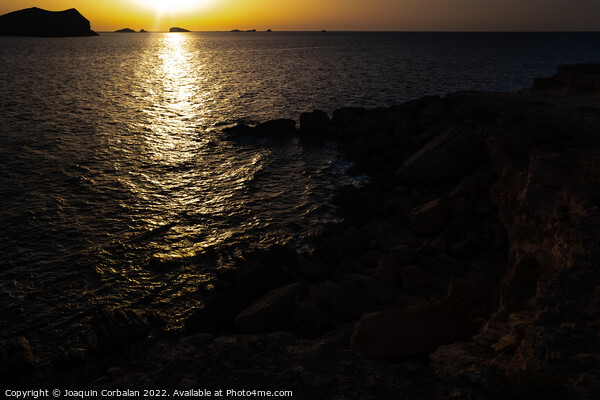 A warm sunset with the sun reflecting on the surface of the sea, Picture Board by Joaquin Corbalan