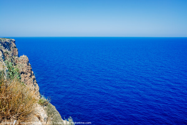 Intense blue sea, relaxing background of the coast seen from abo Picture Board by Joaquin Corbalan