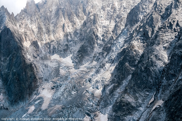 Rugged and dangerous mountain peaks high in the Alps losing thei Picture Board by Joaquin Corbalan