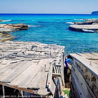 Buy canvas prints of Traditional rustic pier with wooden boards in a cove in Formente by Joaquin Corbalan
