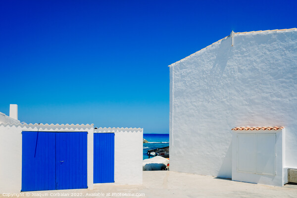 Fisherman's hut with white walls and colorful blue wooden doors  Picture Board by Joaquin Corbalan