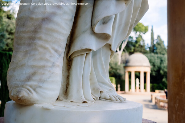 Detail of a marble statue out of focus in the background of a cl Picture Board by Joaquin Corbalan