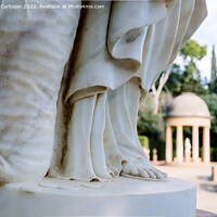 Buy canvas prints of Detail of a marble statue out of focus in the background of a cl by Joaquin Corbalan