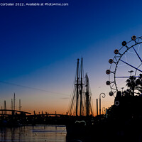 Buy canvas prints of Sunset in the port of Barcelona, with ferris wheel in the backgr by Joaquin Corbalan