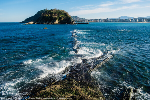 The sea beats hard on the coast and leaves visible geological fo Picture Board by Joaquin Corbalan
