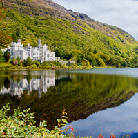 Buy canvas prints of Kylemore Abbey, reflected in the lake, Ireland. by Joaquin Corbalan