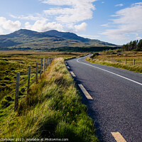 Buy canvas prints of Travelers in search of solitude and nature are enchanted by the Irish roads. by Joaquin Corbalan