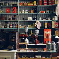 Buy canvas prints of Shelves with products in old store by Joaquin Corbalan
