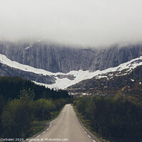 Buy canvas prints of Challenging road to a rocky mountain with fog by Joaquin Corbalan