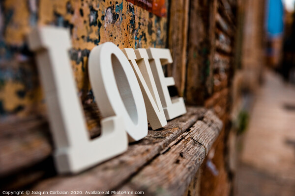 Wooden letters forming the word love Picture Board by Joaquin Corbalan