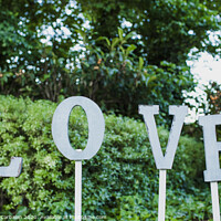 Buy canvas prints of Word Love in wooden letters to decorate a wedding. by Joaquin Corbalan