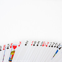 Buy canvas prints of Deck of cards deployed with a white background and space for text. by Joaquin Corbalan