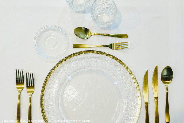 Luxury gold cutlery ideal for business meals or special occasions at Christmas. Picture Board by Joaquin Corbalan