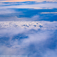 Buy canvas prints of Sea of blue and white clouds seen from above. by Joaquin Corbalan