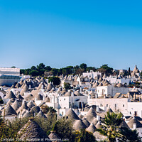 Buy canvas prints of Roofs with symbols in the trulli, in the famous Italian city of Alberobello. by Joaquin Corbalan