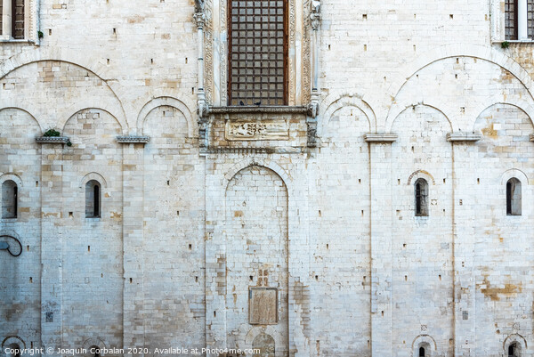 Stone walls of the medieval cathedral of San Nicolas di Bari. Picture Board by Joaquin Corbalan