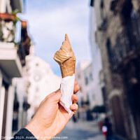 Buy canvas prints of A waffle with ice cream during a walk through an Italian city. by Joaquin Corbalan