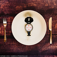 Buy canvas prints of Intermittent fasting diet to lose weight illustrated with an empty plate. by Joaquin Corbalan