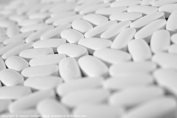 Macro close-up of many white pills, medication concept Picture Board by Joaquin Corbalan