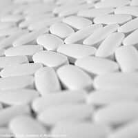 Buy canvas prints of Macro close-up of many white pills, medication concept by Joaquin Corbalan