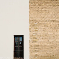 Buy canvas prints of Background of a wall half white and half with bricks, divided into two halves. by Joaquin Corbalan