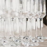 Buy canvas prints of Group of empty and transparent champagne glasses in a restaurant.Group of empty and transparent champagne glasses in a restaurant. by Joaquin Corbalan