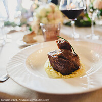 Buy canvas prints of Meat dish served elegantly in a luxurious wedding in an event restaurant. by Joaquin Corbalan