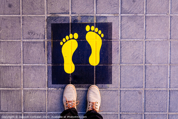 Foot standing on a street a safe way mark for children on the way to school. Picture Board by Joaquin Corbalan