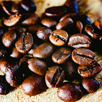 Buy canvas prints of Detail of roasted coffee beans, produced in Colombia. by Joaquin Corbalan