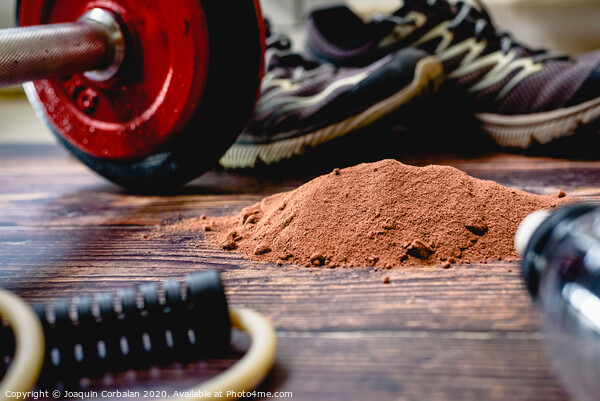 Athletes need to consume extra protein powder supplement, in the image with cocoa flavor, to improve their sports performance. Picture Board by Joaquin Corbalan
