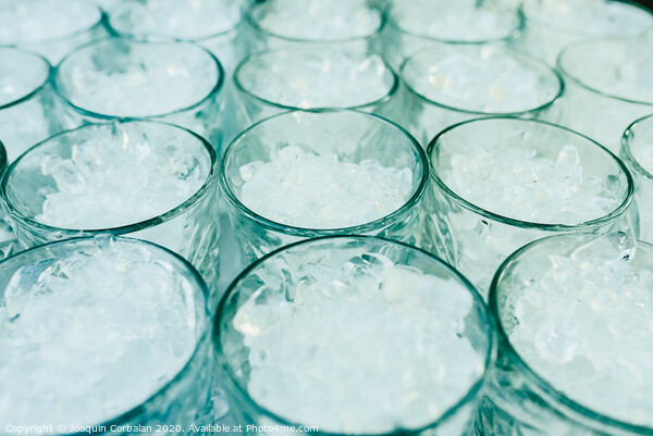 Pattern of glasses with ice ready to prepare a cocktail with refreshing background. Picture Board by Joaquin Corbalan