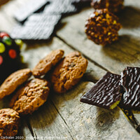 Buy canvas prints of Chip cookies and chocolates pralines to take pleasure in Christmas holidays by Joaquin Corbalan