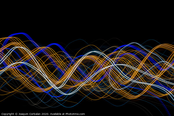 Colorful light painting with circular shapes and abstract black background. Picture Board by Joaquin Corbalan