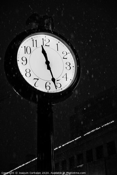 Street clock during a snowfall, time passes. Picture Board by Joaquin Corbalan