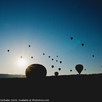 Buy canvas prints of Colorful balloons flying over mountains and with blue sky by Joaquin Corbalan