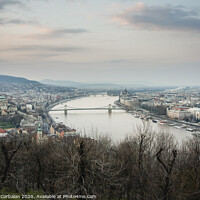 Buy canvas prints of Sunset view of the city of Budapest on a cloudy day. by Joaquin Corbalan