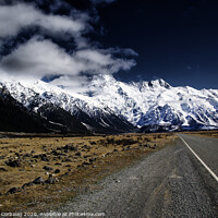 Buy canvas prints of Snowy mountains among clouds from road by Joaquin Corbalan