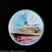Buy canvas prints of Ship moored to port seen through from inside the porthole of a ship. by Joaquin Corbalan