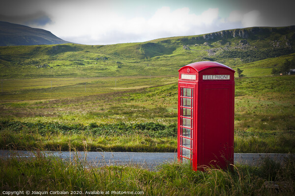 Typical red English telephone box in a rural area near a road. Picture Board by Joaquin Corbalan