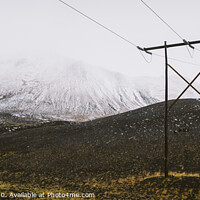 Buy canvas prints of Poles of electricity in the middle of a snowy mountain to supply electrical power to remote villages. by Joaquin Corbalan