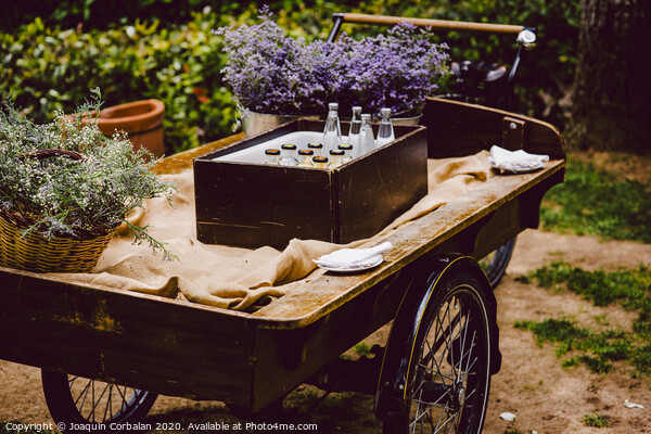 Old wooden cart to transport goods used for decoration at a wedding. Picture Board by Joaquin Corbalan