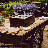 Buy canvas prints of Old wooden cart to transport goods used for decoration at a wedding. by Joaquin Corbalan