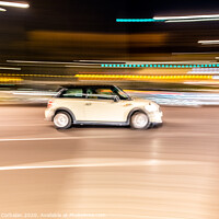 Buy canvas prints of Car rolling at full speed through the city at night, image of panning, with defocused background lights. by Joaquin Corbalan